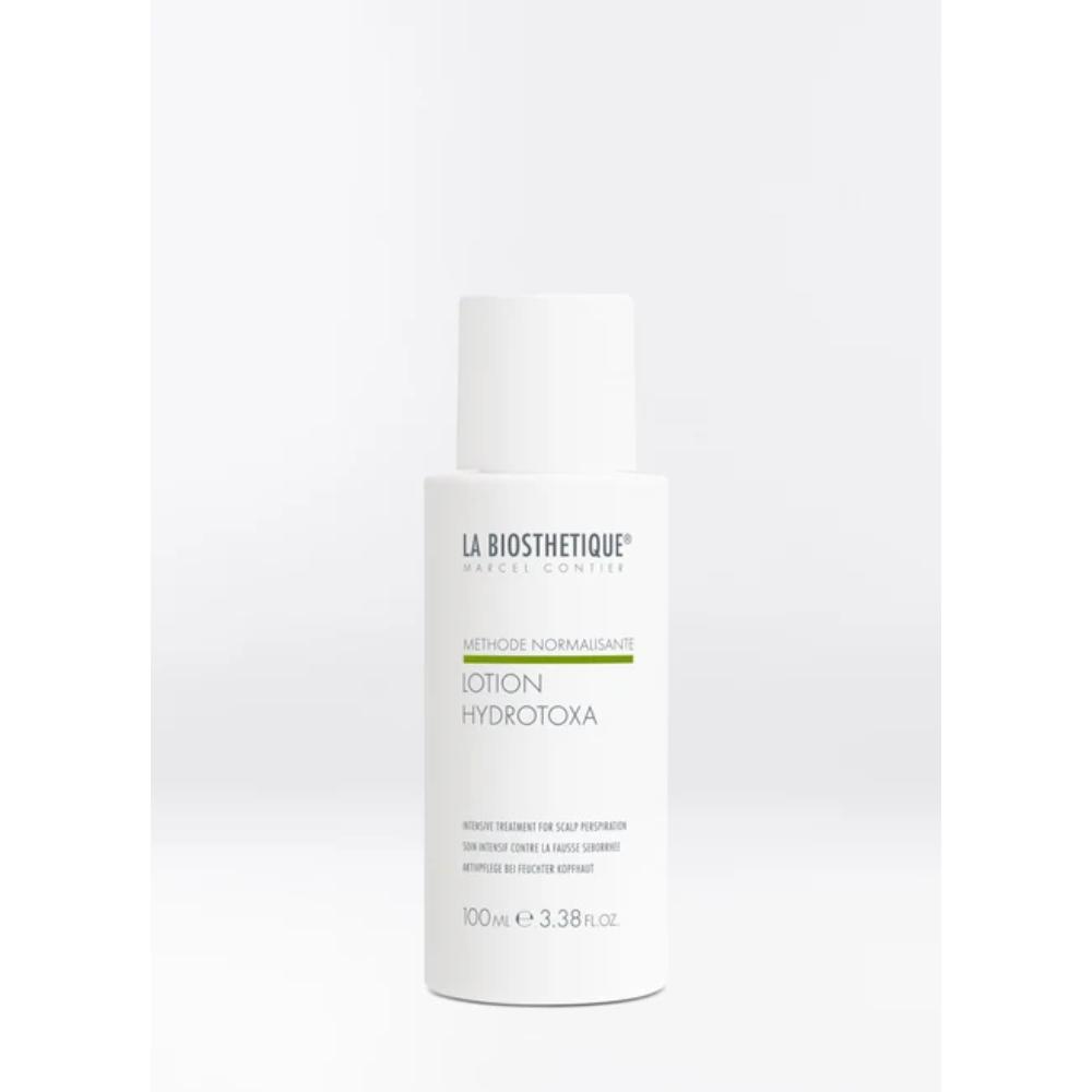 Lotion Hydrotoxa Methode Normalisante apaise les cuirs chevelus humides, stoppe les effets négatifs de la sécrétion de transpiration.