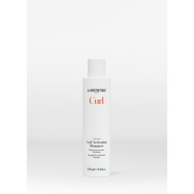 Shampoing activateur de boucles offre aux cheveux bouclés une protection contre la déshydratation, les laissant brillants, faciles à coiffer et doux.